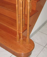 spindles mounted on new hardwood planks